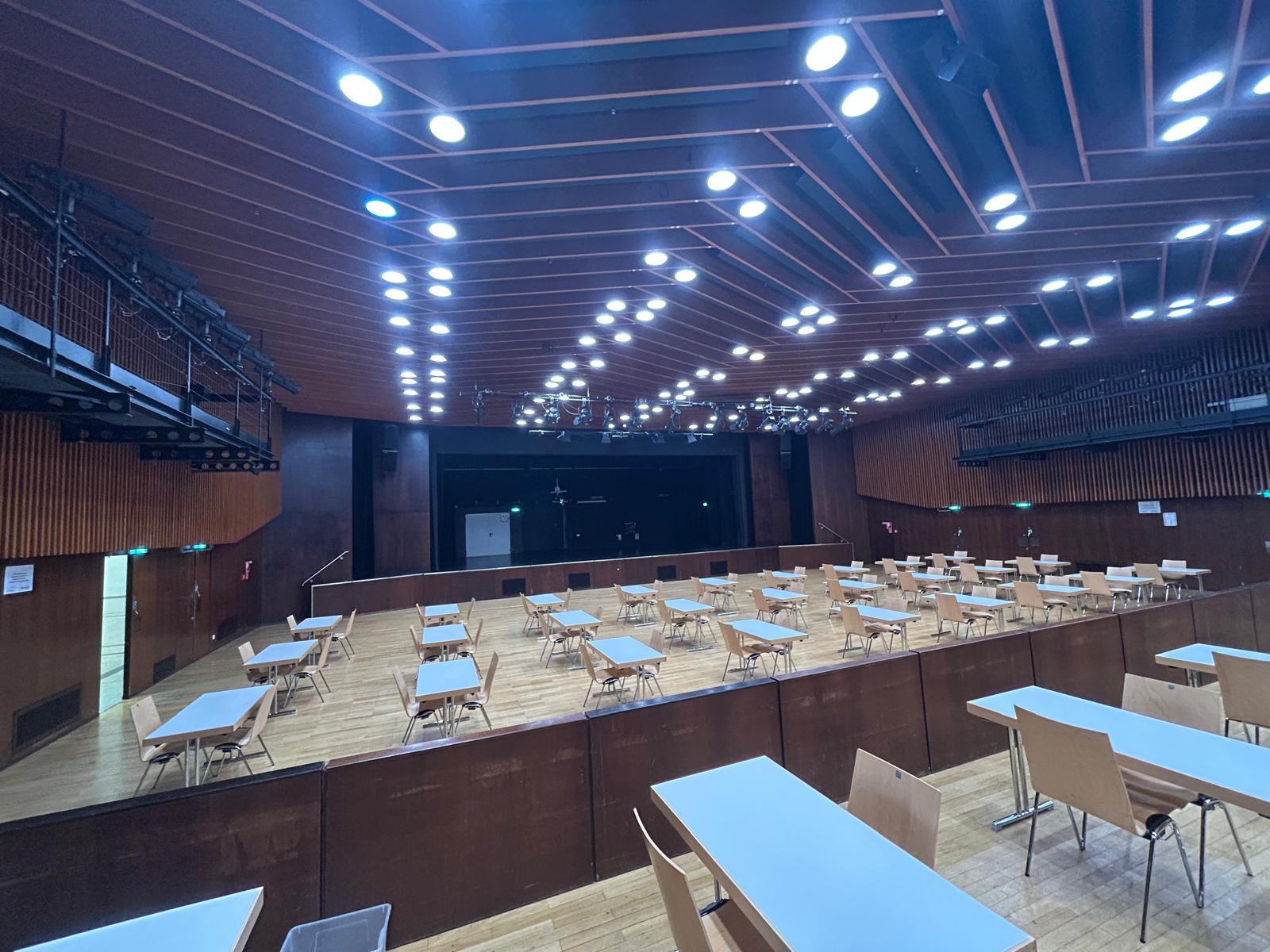 Saalbau event hall in Frankfurt set up with tables and chairs for the HMEurope matchmaking event