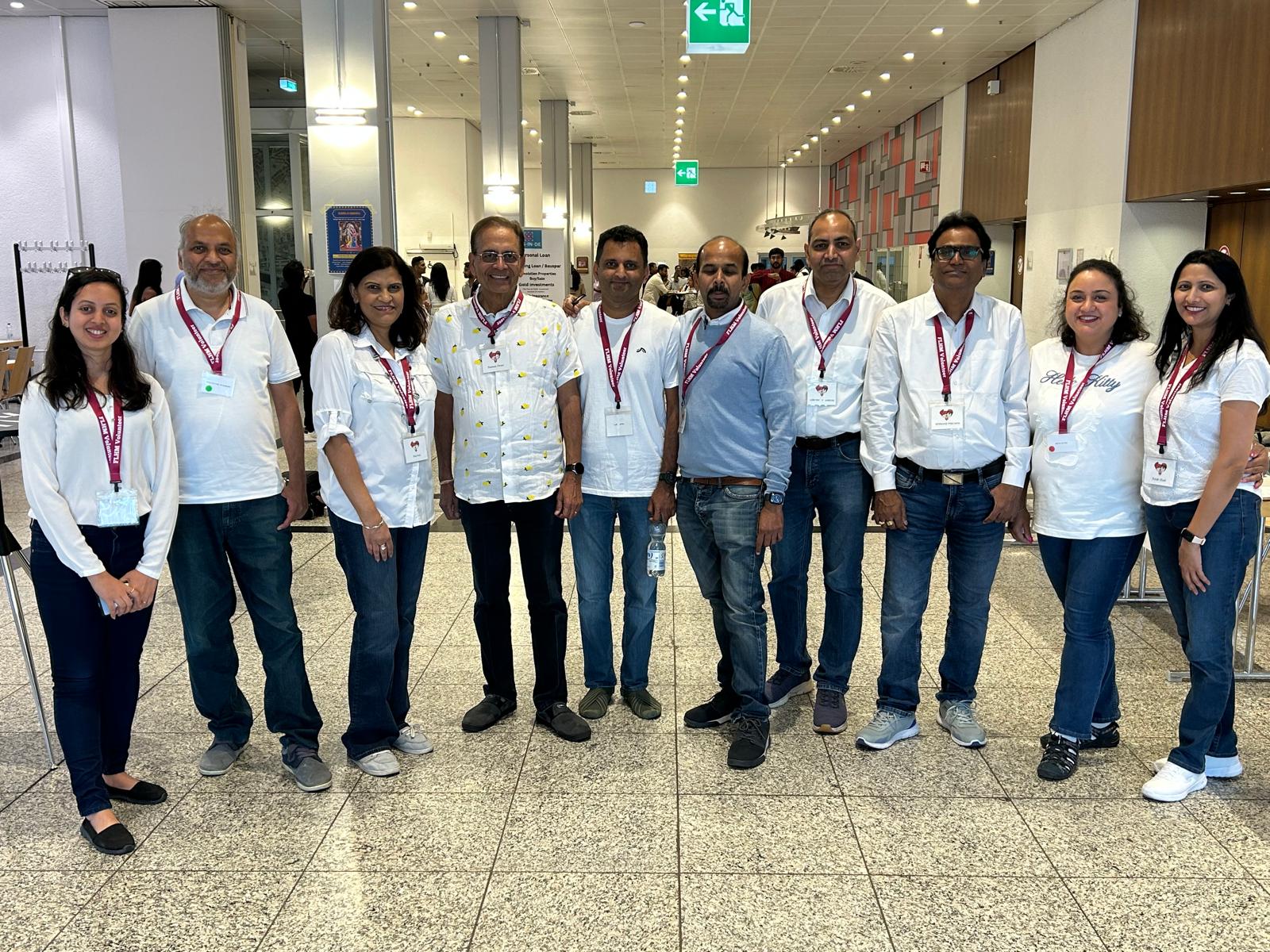 HMEurope volunteer team smiling together at the Frankfurt event entrance