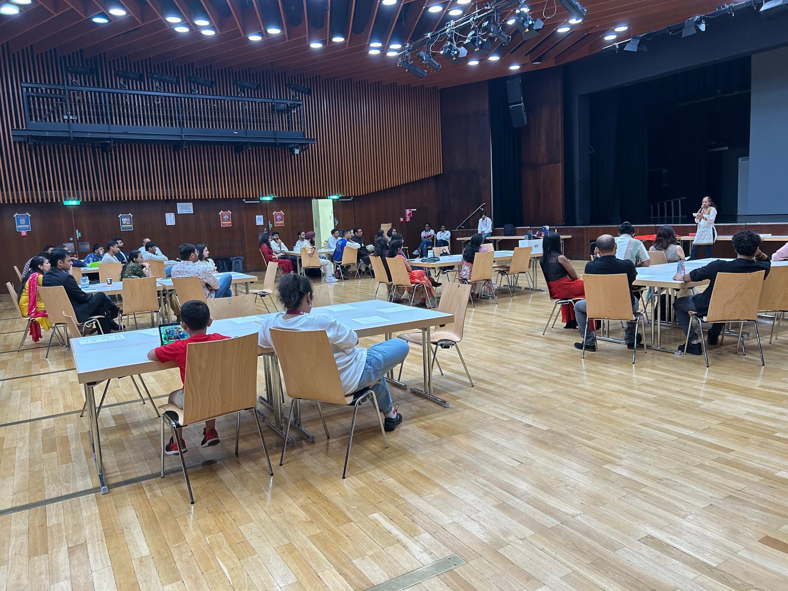 Attendees seated at speed dating tables during the HMEurope Frankfurt event